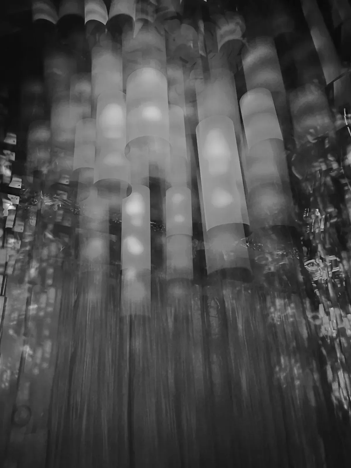 a distorted photo of light fixtures